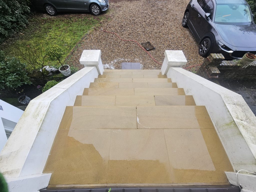 Overhead view of cleaned exterior stone staircase.
